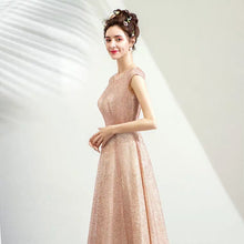 Load image into Gallery viewer, The Laura Champagne Glitter Sleeveless Gown - WeddingConfetti