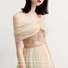 Load image into Gallery viewer, The Raylynn Champagne Tulle Off Shoulder Gown - WeddingConfetti