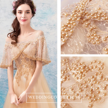 Load image into Gallery viewer, The Windermere Gold Flare Sleeves Gown - WeddingConfetti