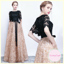 Load image into Gallery viewer, The Charlize Floral Lace Black & Gold Long Sleeves Gown - WeddingConfetti