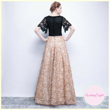 Load image into Gallery viewer, The Charlize Floral Lace Black & Gold Long Sleeves Gown - WeddingConfetti