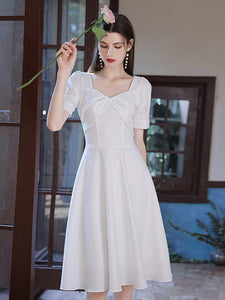 The Oriana White Short Sleeves Dress