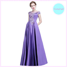 Load image into Gallery viewer, The Prunella Purple Lilac Off Shoulder Gown - WeddingConfetti