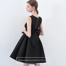 Load image into Gallery viewer, The Amelia Bow White / Black Sleeveless Dress (Available in 2 colours) - WeddingConfetti