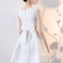 Load image into Gallery viewer, The Amelia Bow White / Black Sleeveless Dress (Available in 2 colours) - WeddingConfetti