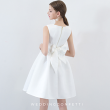 Load image into Gallery viewer, The Amelia Bow White / Black Sleeveless Dress (Available in 2 colours) - WeddingConfetti
