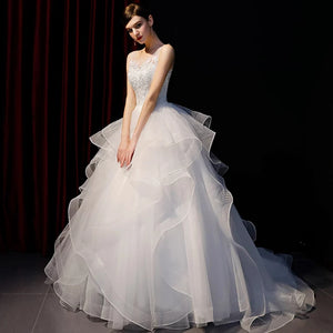 The Meredith Wedding Bridal Sleeveless Illusion Gown - WeddingConfetti