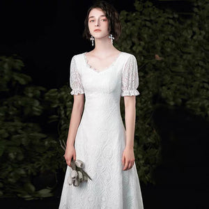 The Tetrine Wedding Bridal Short Sleeves Lace Gown