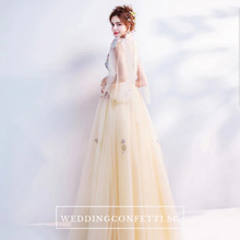 Load image into Gallery viewer, The Gregery Light Yellow 3D floral Flare Sleeves Gown - WeddingConfetti