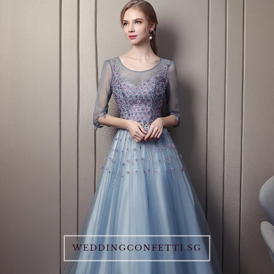 The Rerraine Blue Illusion Neckline Long Sleeves Gown - WeddingConfetti