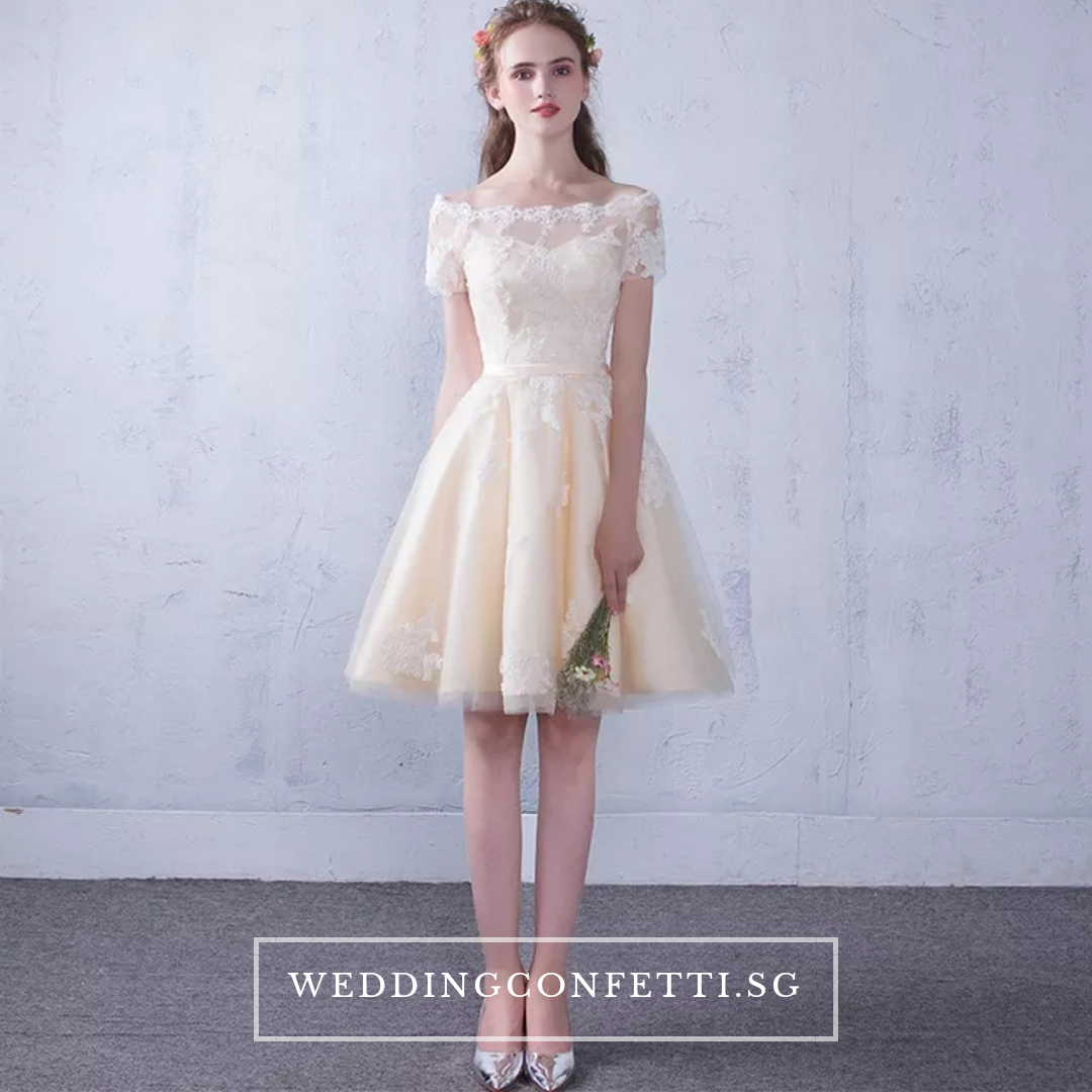The Lynne Off Shoulder Gown (Available in 3 Colours) WeddingConfetti The Lynne Off Shoulder Gown (Available in 3 Colours) WeddingConfetti