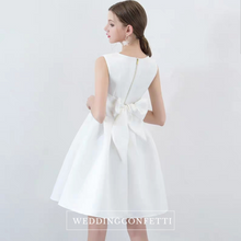 Load image into Gallery viewer, The Amelia Bow White / Black Sleeveless Dress (Available in 2 colours) - WeddingConfetti