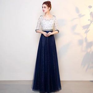 The Tabitha White Navy Blue Long Sleeves Gown - WeddingConfetti