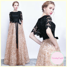 Load image into Gallery viewer, The Charlize Floral Lace Black &amp; Gold Long Sleeves Gown - WeddingConfetti