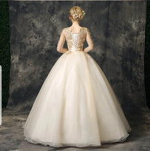 Load image into Gallery viewer, The Stellar Champagne Ball Gown - WeddingConfetti