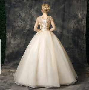 The Stellar Champagne Ball Gown - WeddingConfetti