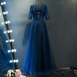 The Meredy Long Sleeve Midnight Blue Gown - WeddingConfetti