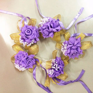 Wedding Flower Wrist Corsages - WeddingConfetti