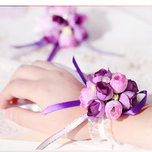 Wedding Flower Wrist Corsages - WeddingConfetti
