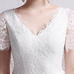 The Petunia Wedding Bridal Illusion Short Draped Sleeves Lace Gown - WeddingConfetti