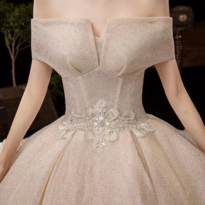 The Fenelee Wedding Bridal Off Shoulder Champagne Gown - WeddingConfetti