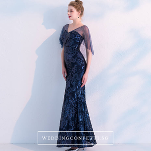 The Tina Blue Cape Sleeve  Gown - WeddingConfetti