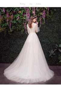 The Kylie Wedding Bridal Illusion Sleeve Lace Gown - WeddingConfetti